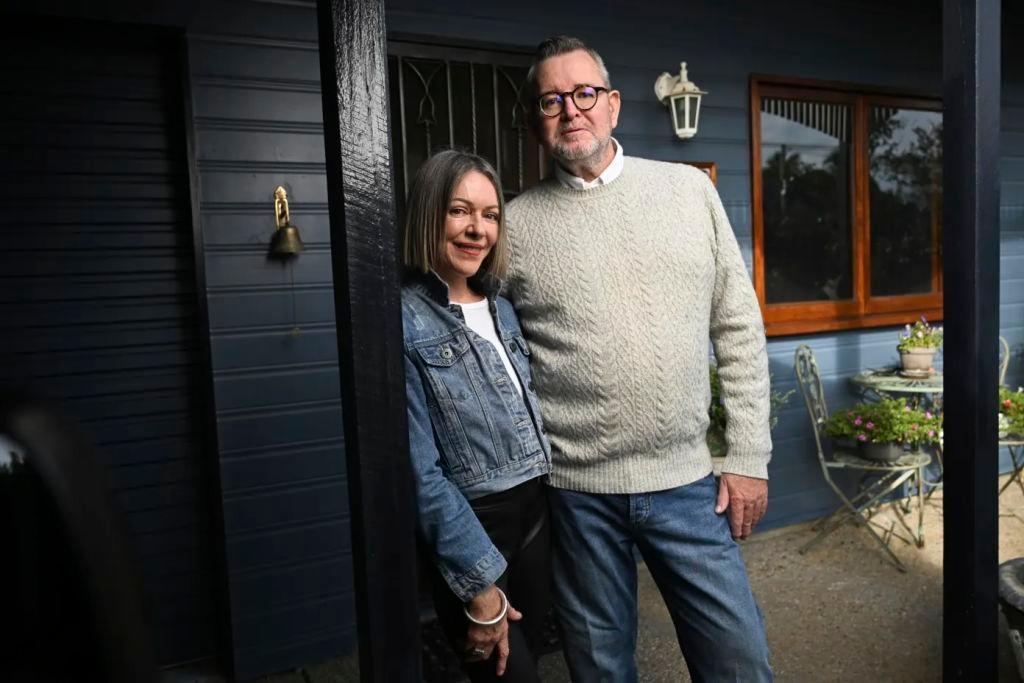 Glenn_and_Susie_Molloy_outside_their_home_of_16_years_in_Camp_Hill_in_Brisbane_s_inner_east._They_are_set_to_move_out_of_the_family_home_later_this_month._Dan_Peled_zwuhnb